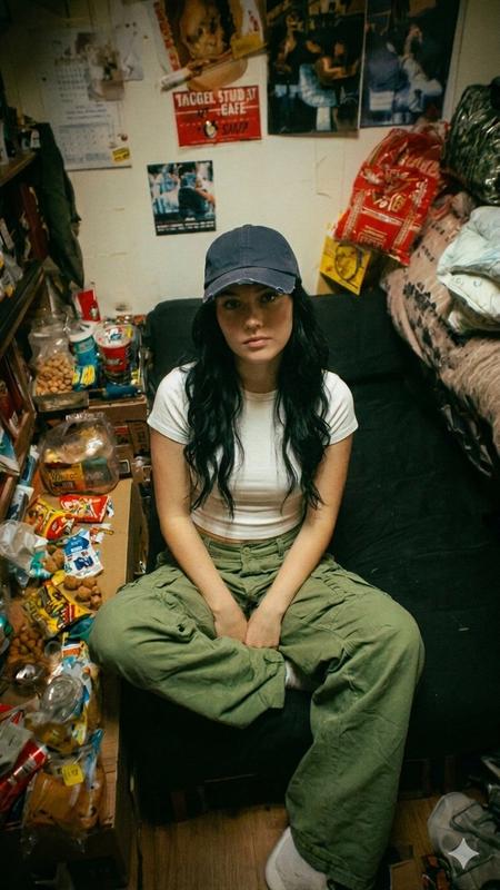 Messy Dorm Baseball Cap Cross-Legged Indie Film Portrait