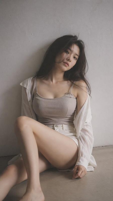 Young woman portrait in soft black mist