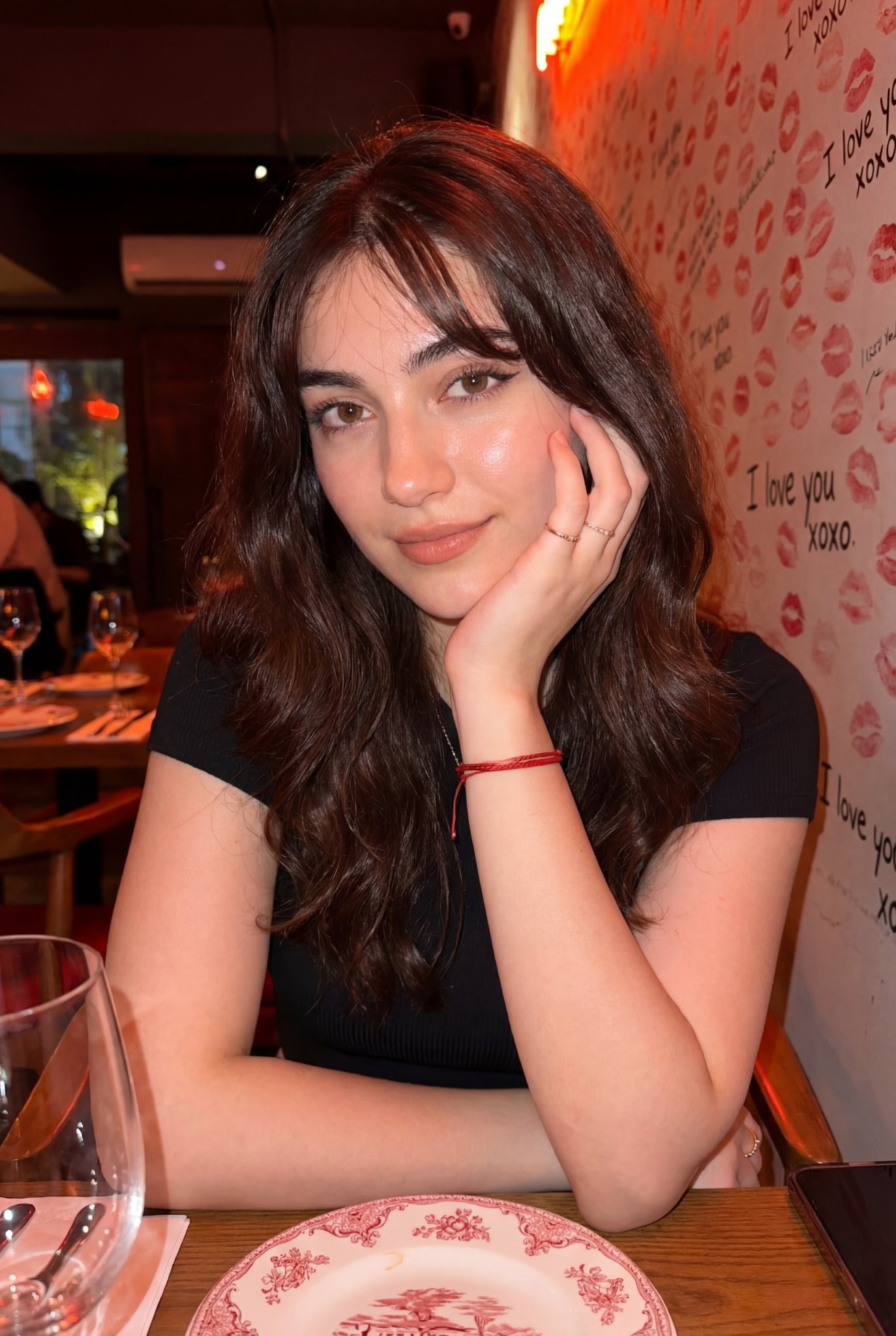 Warm-Lit Restaurant Kiss-Wall Portrait