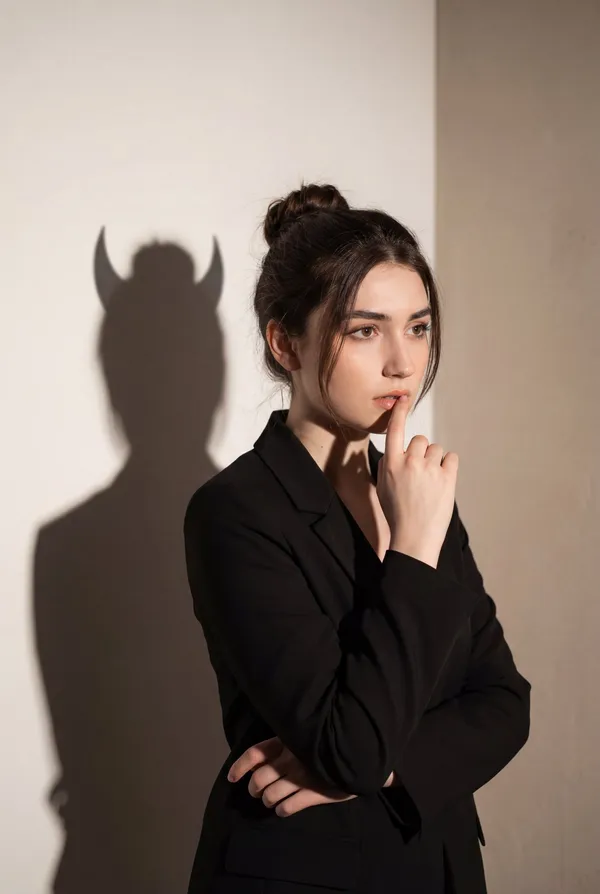 Psychological Portrait of Woman with Demon Shadow